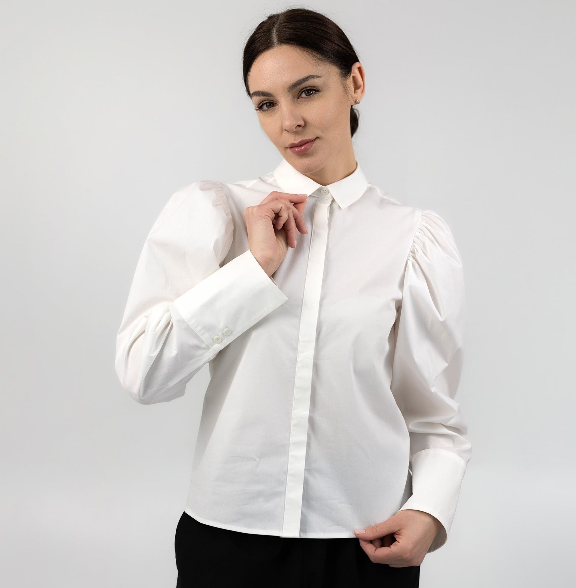 White cotton blouse with volume sleeves