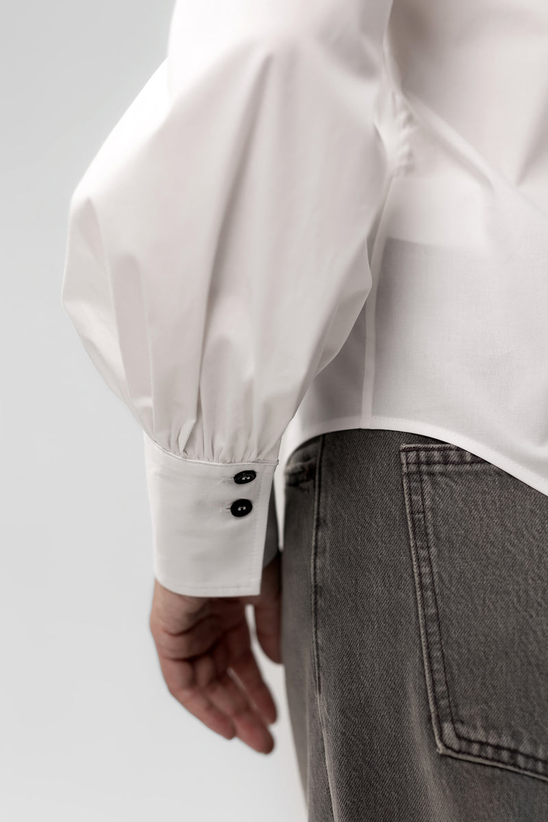 White cotton blouse with pointed collar