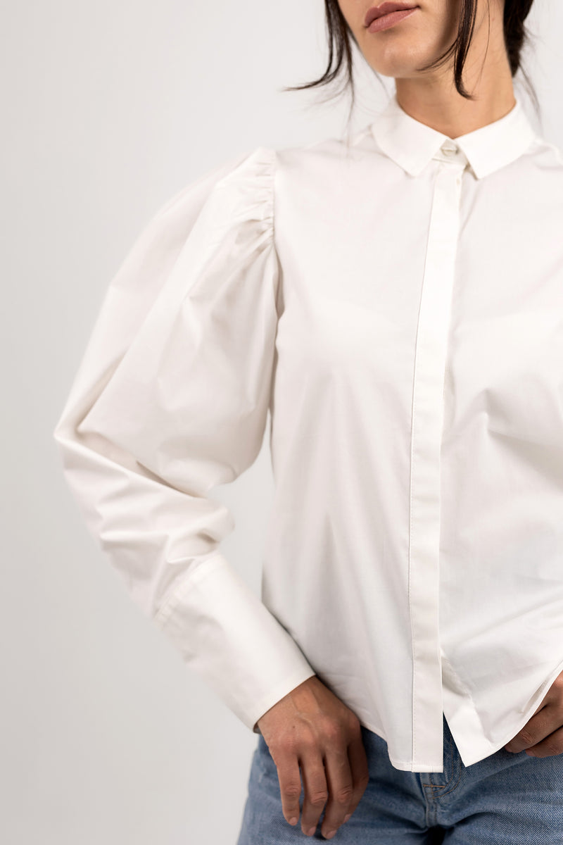 White cotton blouse with volume sleeves